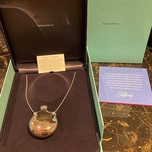Limited sterling silver Elsa Peretti flower pendant with original note from T&Co